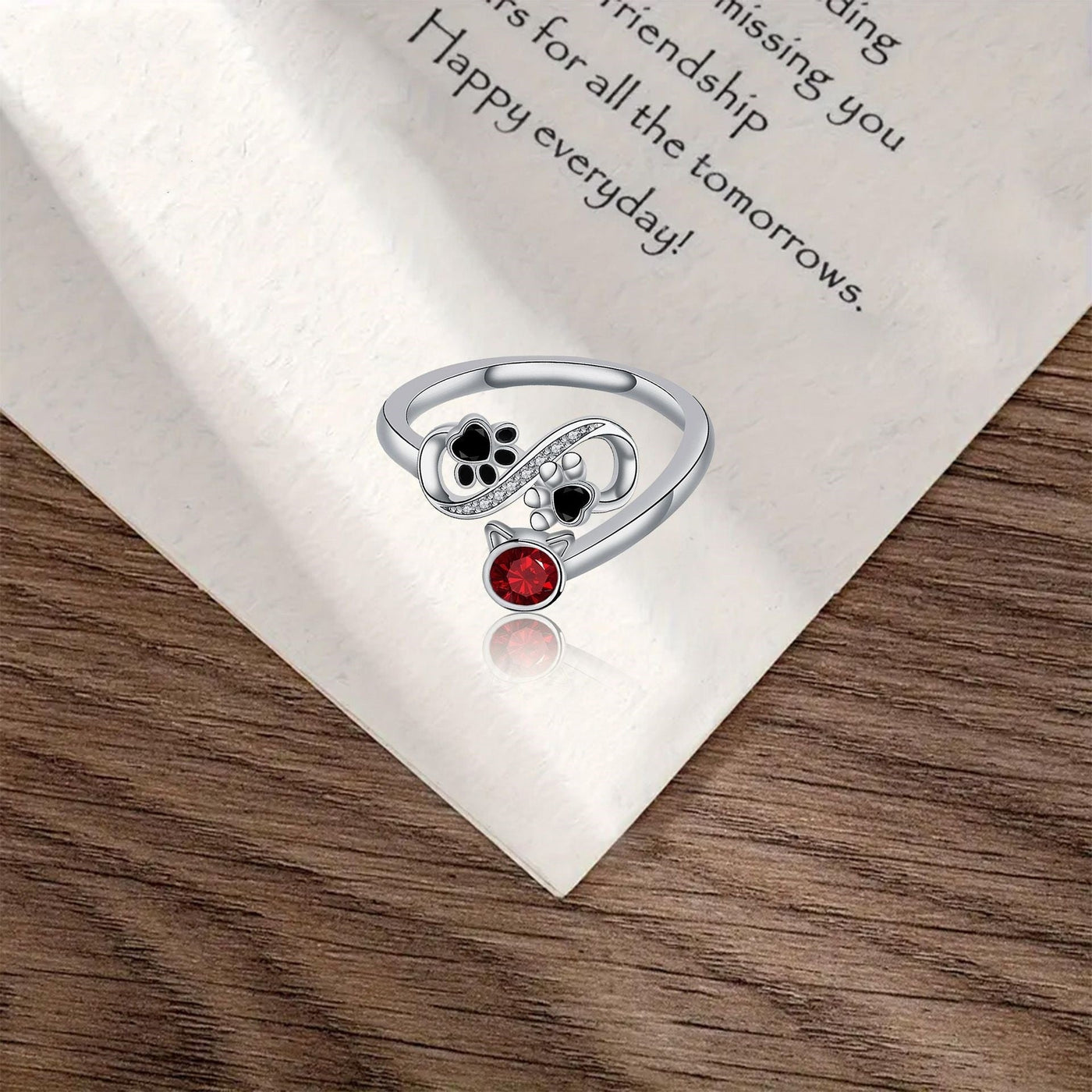 Black Paw Adjustable Ring With Red Gemstone